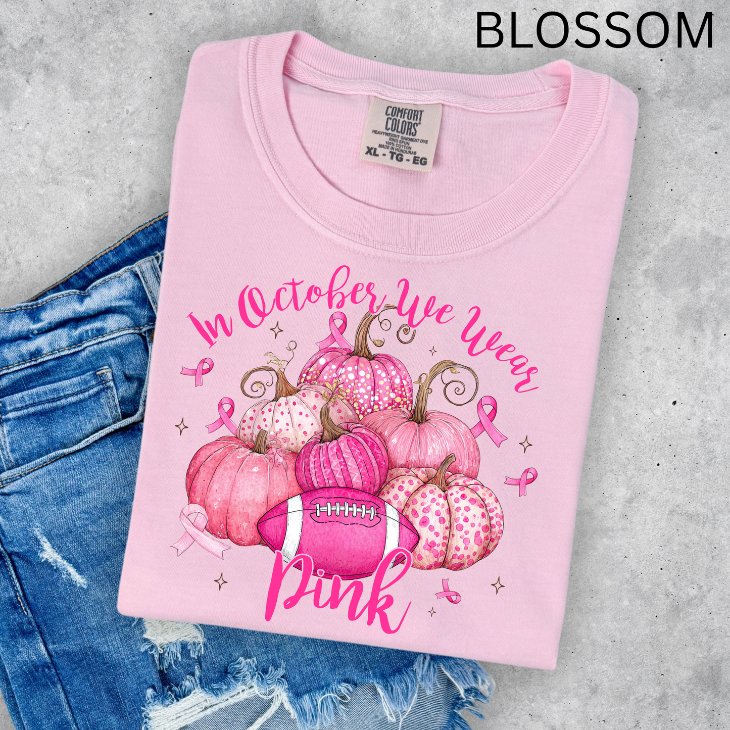 IN OCTOBER WE WEAR PINK PUMPKINS WITH FOOTBALL COMFORT COLORS TEES