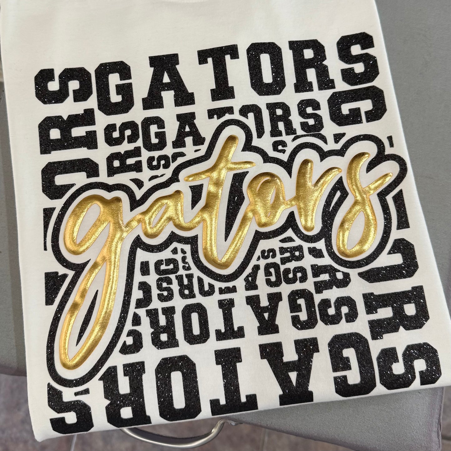BLACK GLITTER AND GOLD PUFF GATORS TEE & SWEATSHIRT
