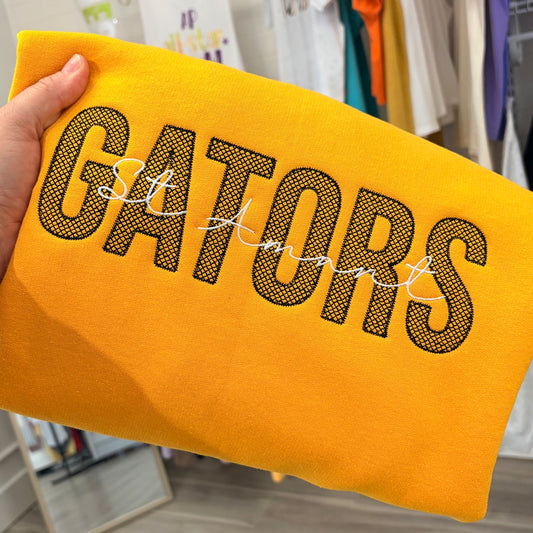 BLACK DIAMOND STITCH GATORS ON GOLD