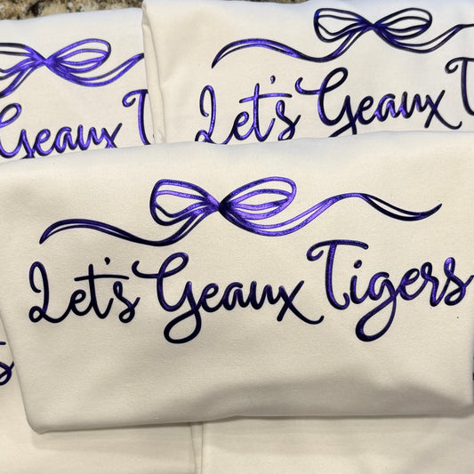 METALLIC PUFF LET.S GEAUX TIGERS TEE & SWEATSHIRT